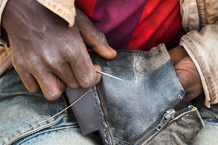 70   Young shoe maker. Ethiopia 